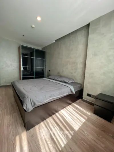 Modern bedroom with sleek design and natural light