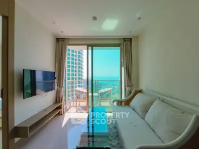 Modern living room with ocean view and balcony access