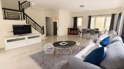 Spacious modern living room with elegant decor and natural light