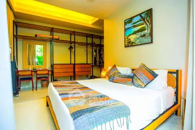 Spacious bedroom with modern decor and open closet design