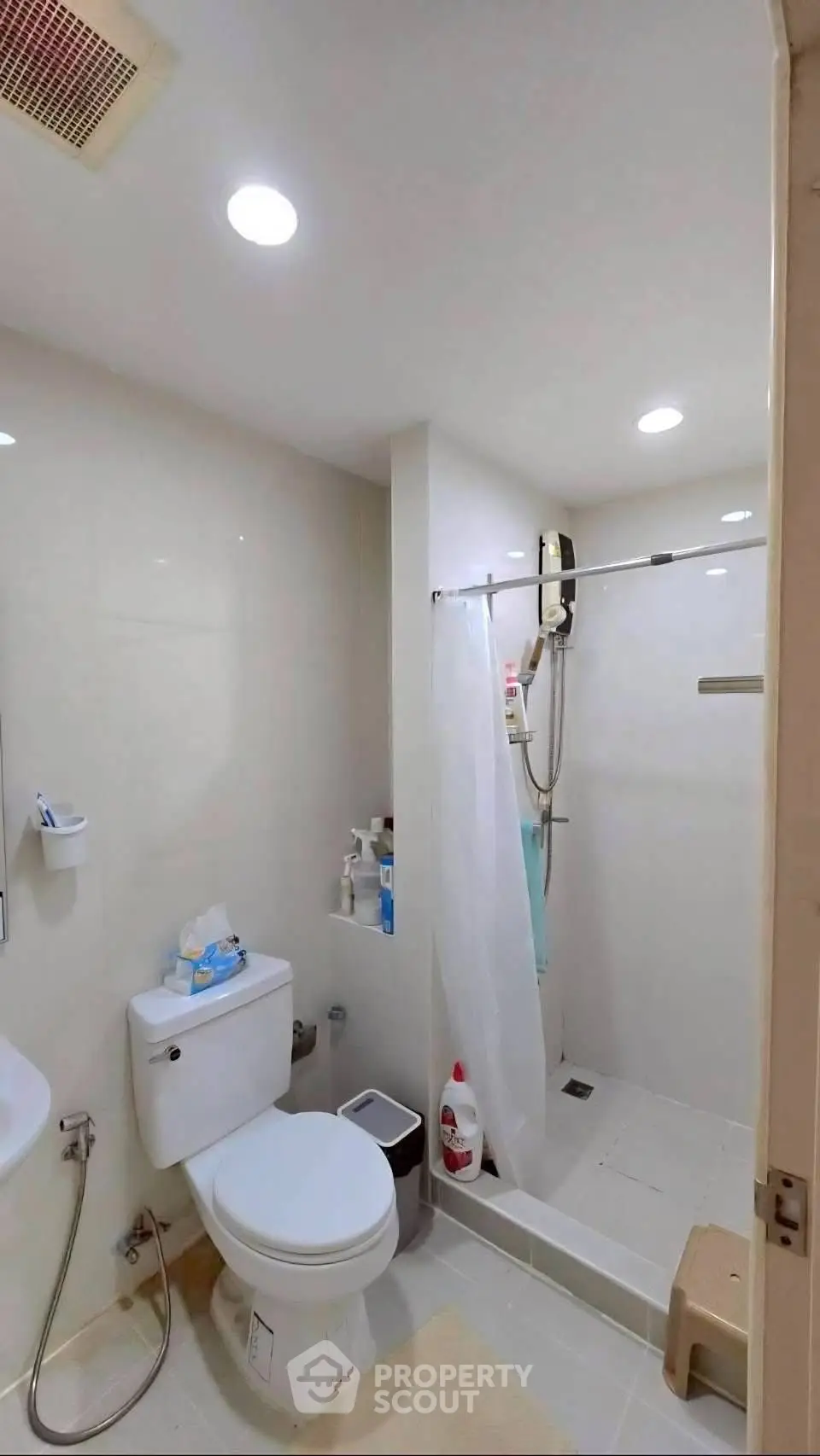 Modern bathroom with shower and toilet in a compact layout