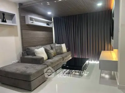 Modern living room with sleek furniture and stylish decor