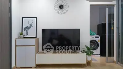 Modern living room with sleek TV setup and stylish decor