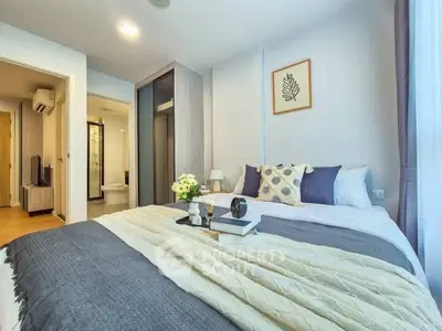 Modern bedroom with cozy decor and natural light