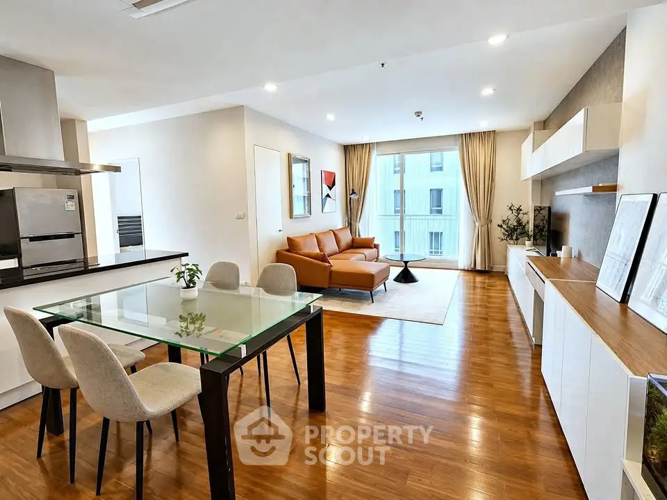 Spacious modern living room with open kitchen and elegant decor