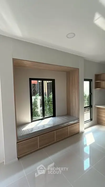 Modern interior with built-in window seat and natural light