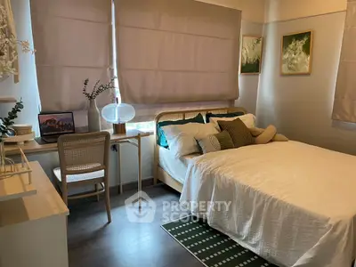 Cozy bedroom with modern decor and natural light