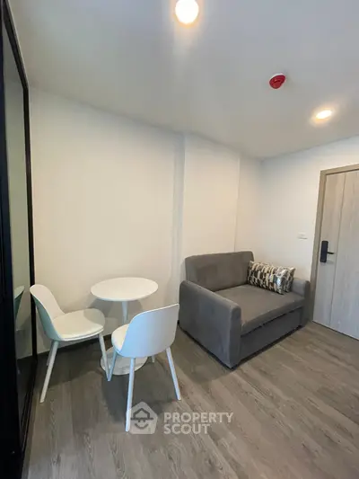 Cozy modern living room with sleek furniture and stylish decor