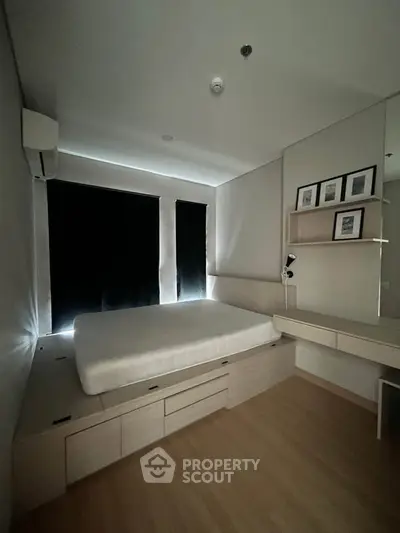 Modern bedroom with built-in storage and minimalist design