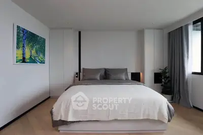 Modern bedroom with minimalist design and natural light