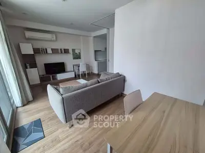 Modern living room with stylish furniture and natural light
