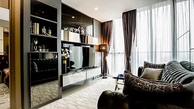 Luxurious modern living room with elegant decor and large windows