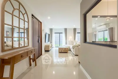 Spacious modern living room with elegant decor and natural light