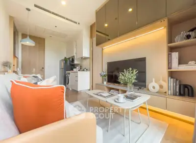 Modern living room with sleek design and open kitchen layout