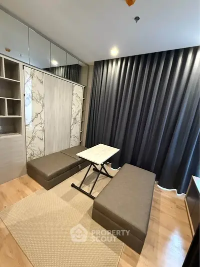 Modern living room with stylish furniture and elegant decor
