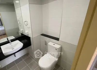 Modern bathroom with sleek fixtures and elegant tile design