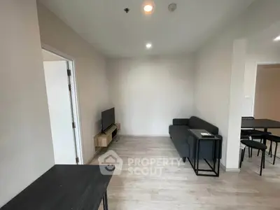 Modern living room with minimalist furniture and neutral tones