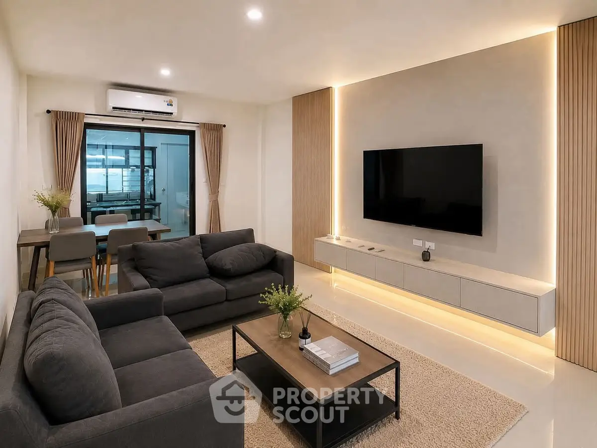 Modern living room with sleek furniture and ambient lighting, perfect for stylish urban living.