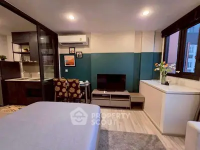Modern studio apartment with stylish decor and open layout