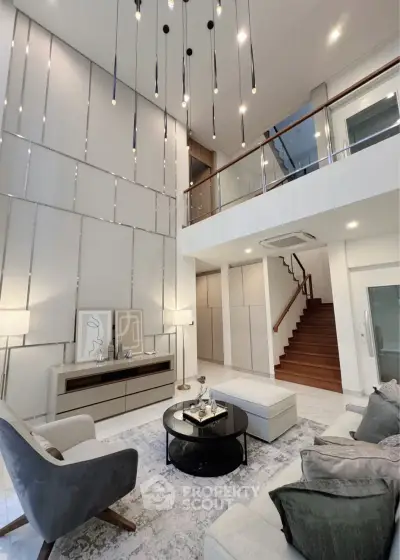 Luxurious modern living room with high ceilings and elegant decor