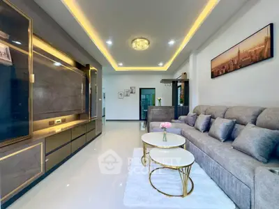 Modern living room with elegant decor and cozy seating area