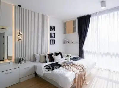 Modern bedroom with elegant decor and natural light