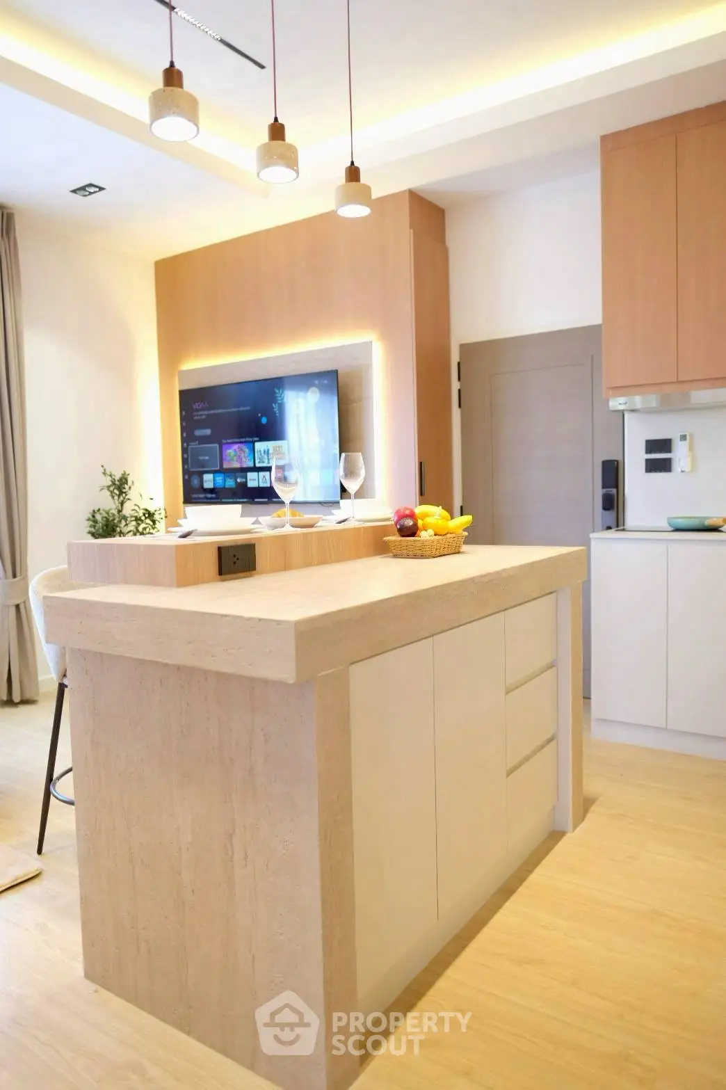 Modern kitchen with open layout and stylish lighting in a contemporary home.