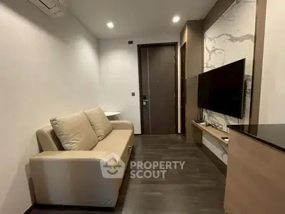 Modern living room with sleek design and wall-mounted TV
