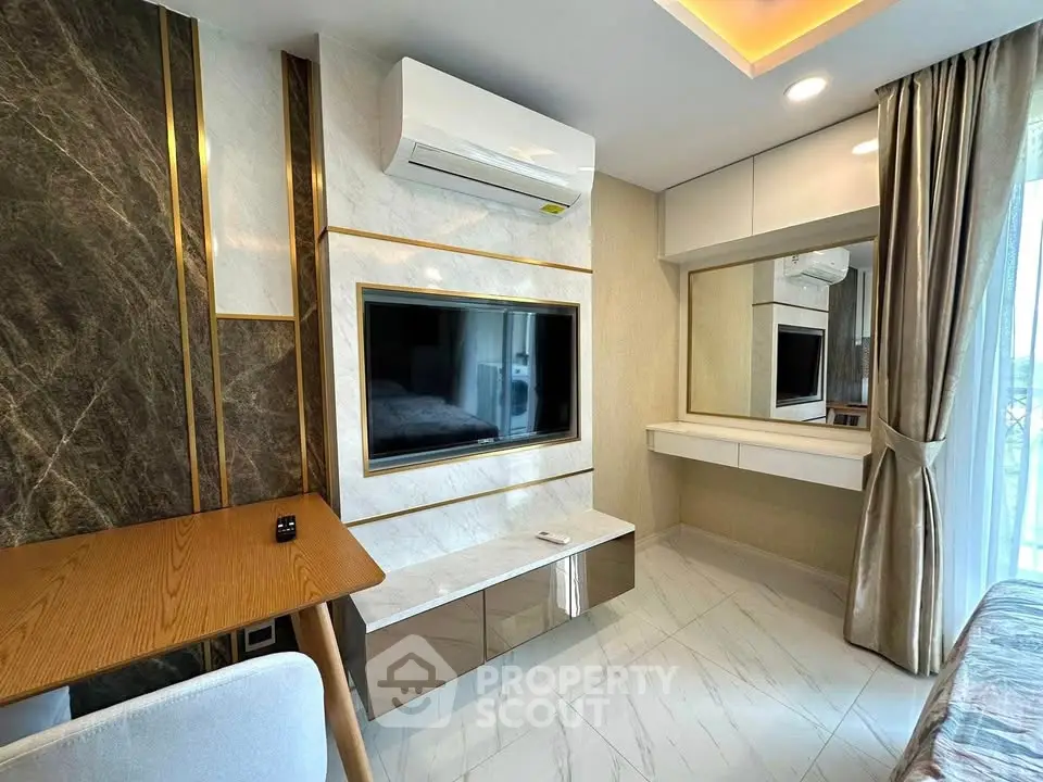 Modern living room with sleek TV setup and elegant decor