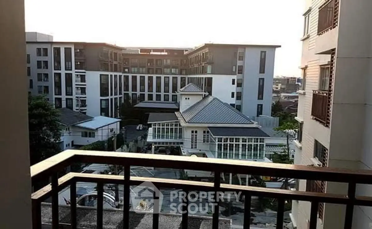 Stunning balcony view of modern residential complex with elegant architecture.