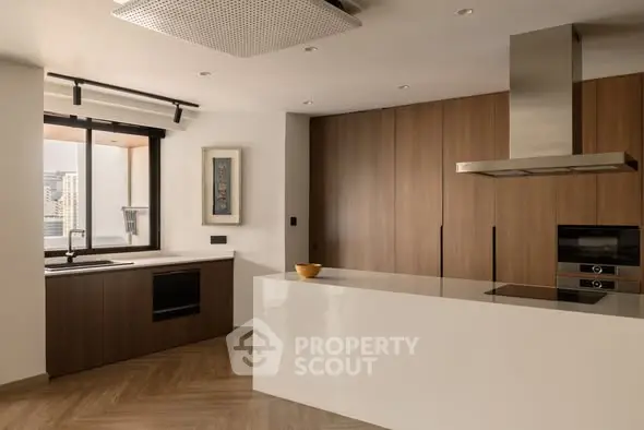 Modern kitchen with sleek design and integrated appliances