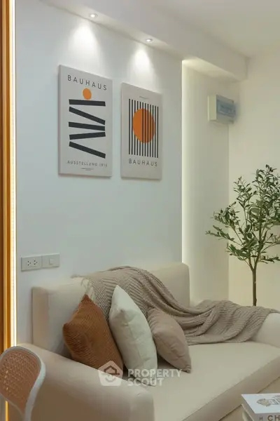 Stylish living room with modern art and cozy decor