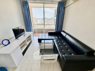 Modern living room with black leather sofa and city view balcony