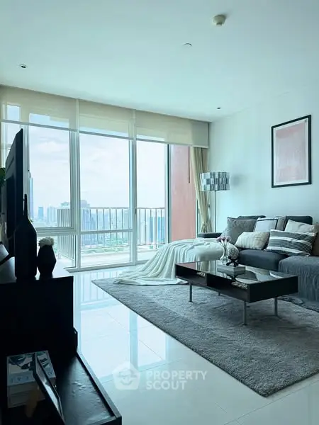 Modern living room with stunning city view and elegant decor
