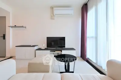 Modern living room with sleek furniture and natural light