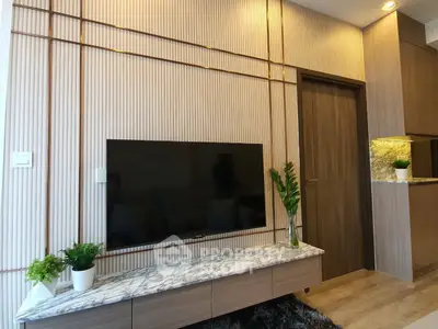 Modern living room with stylish TV setup and elegant decor