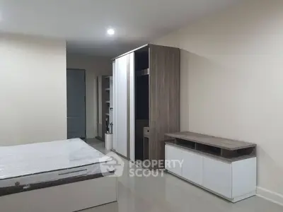 Modern bedroom with sleek furniture and minimalist design