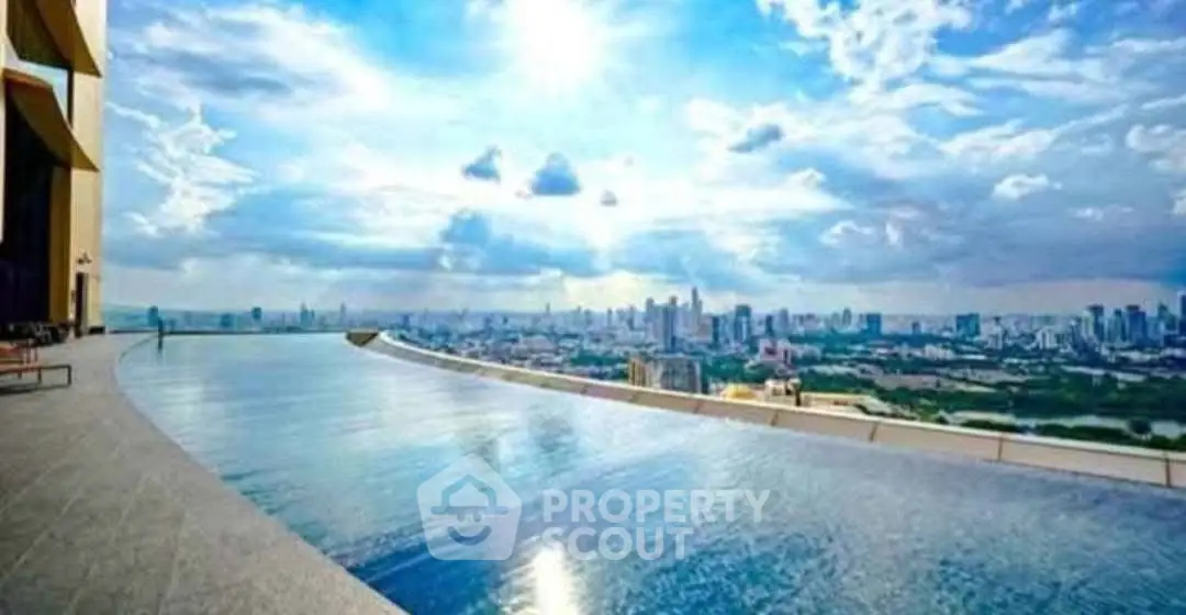 Stunning rooftop infinity pool with breathtaking city skyline view