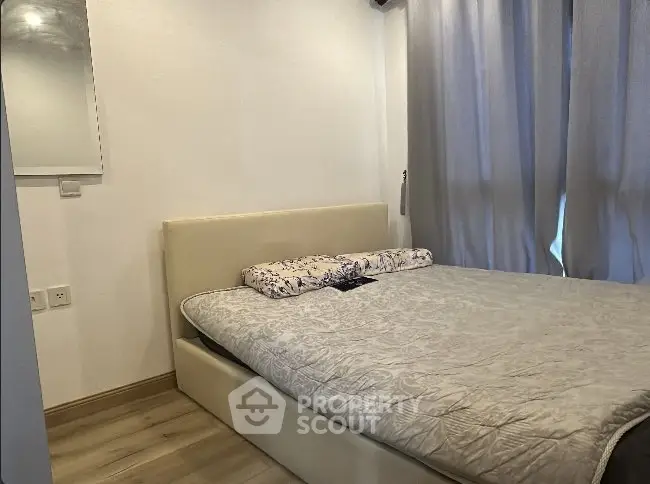 Cozy bedroom with modern decor and natural light