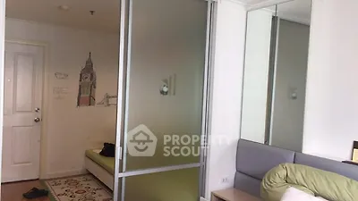 Modern bedroom with frosted glass partition and stylish decor