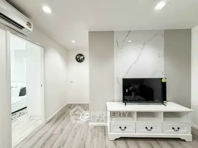 Modern living room with sleek TV stand and elegant decor