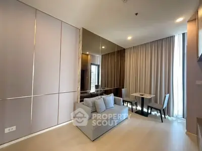Modern living room with elegant decor and cozy seating area