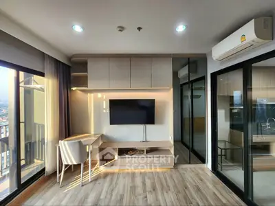 Modern living room with sleek design, large windows, and built-in entertainment unit.
