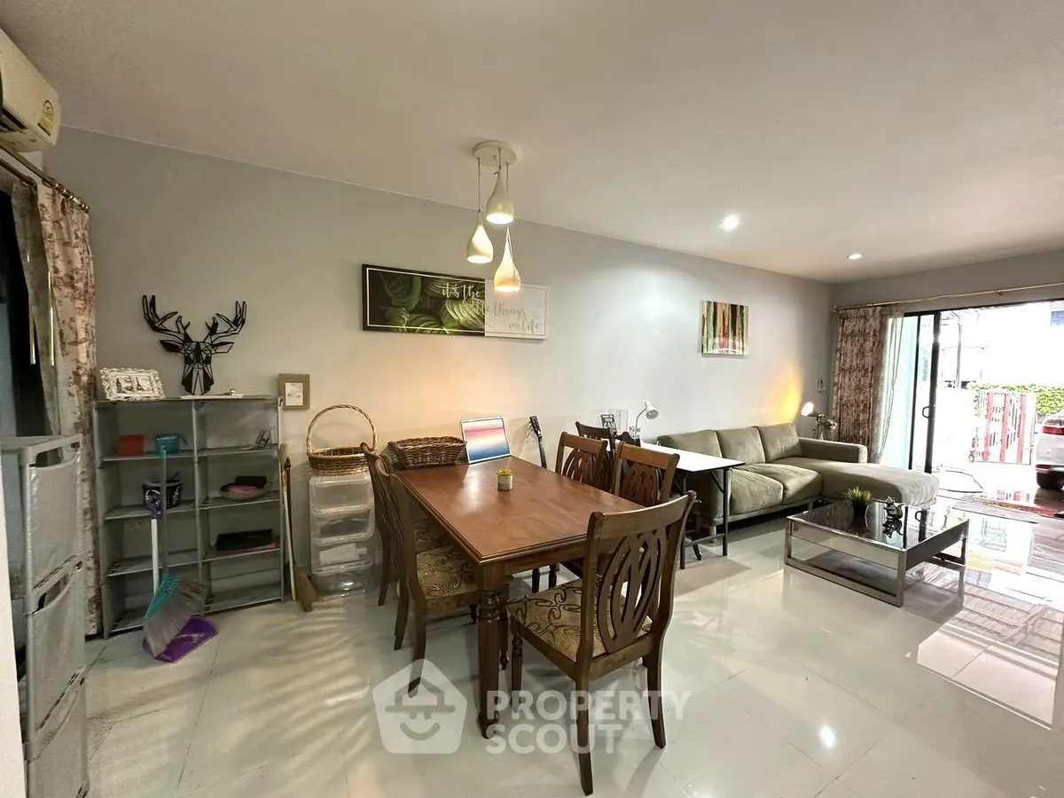 Spacious living room with elegant dining area and modern decor
