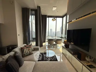Luxurious modern living room with stunning city view and elegant decor