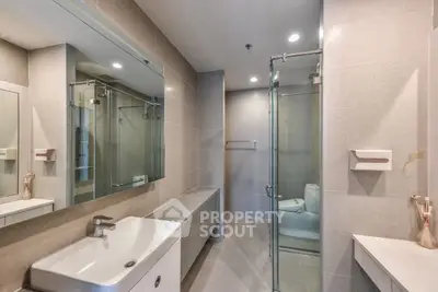 Modern bathroom with sleek design and glass shower enclosure