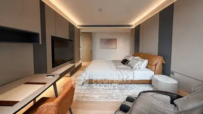 Luxurious modern bedroom with sleek design and cozy ambiance