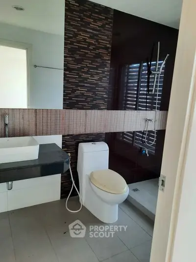 Modern bathroom with sleek design and shower area