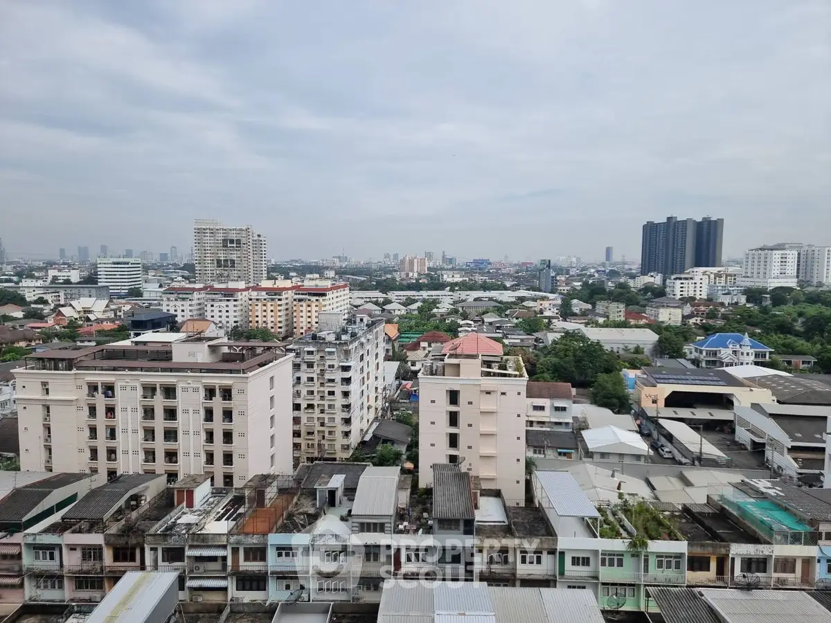 Panoramic cityscape view showcasing diverse architecture and urban skyline.