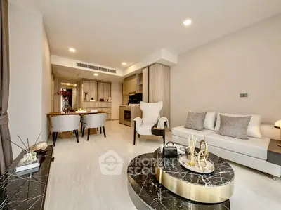 Luxurious modern living room with elegant decor and open kitchen layout, perfect for stylish urban living.